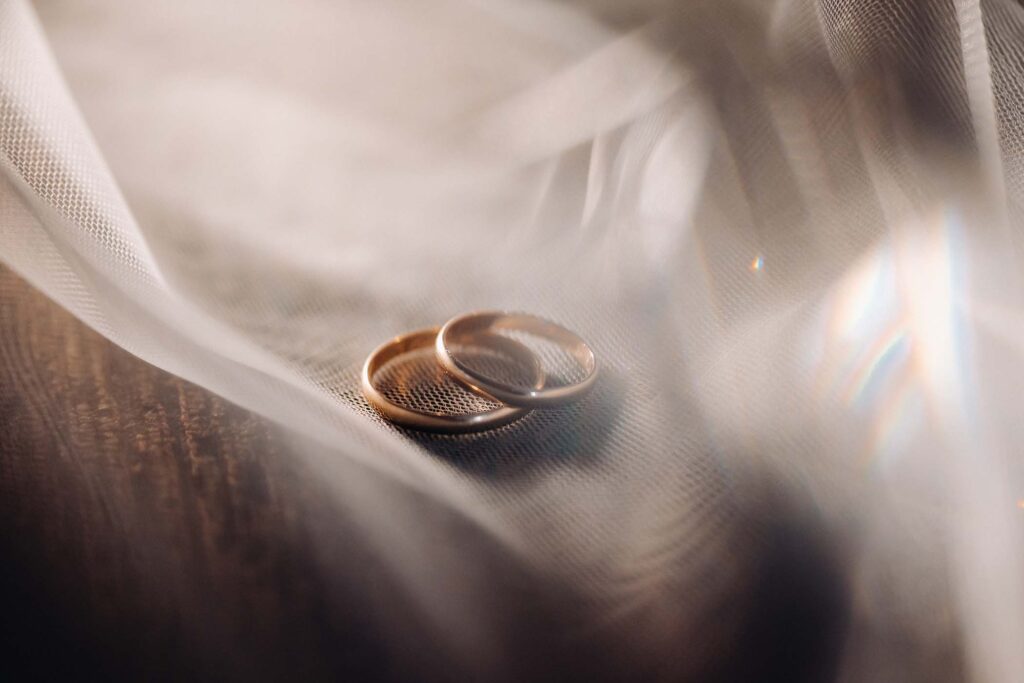 close-up-of-two-gold-wedding-rings-for-a-wedding-2W2AUYY.jpg